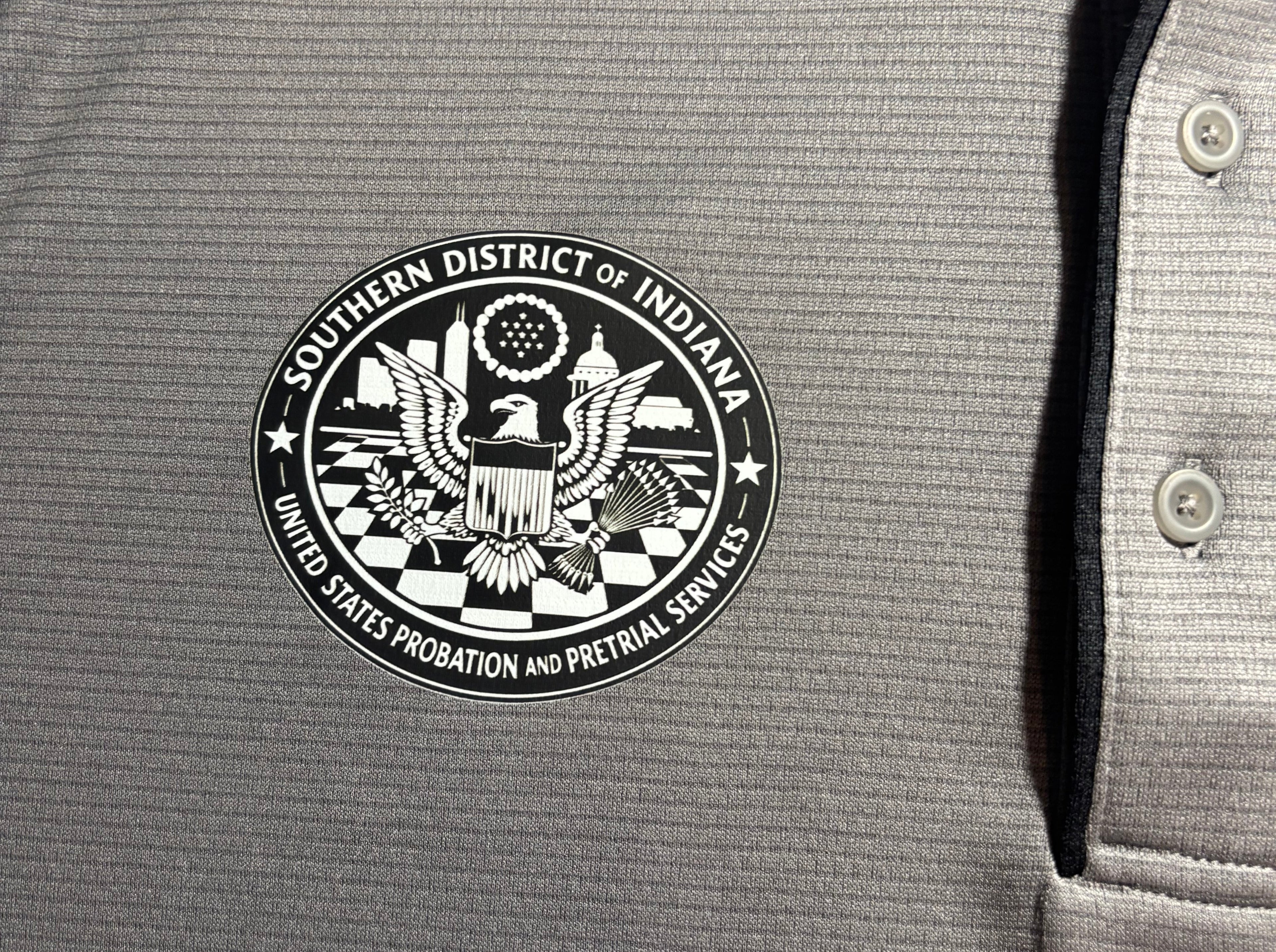 Under Armor polo with embroidered seal