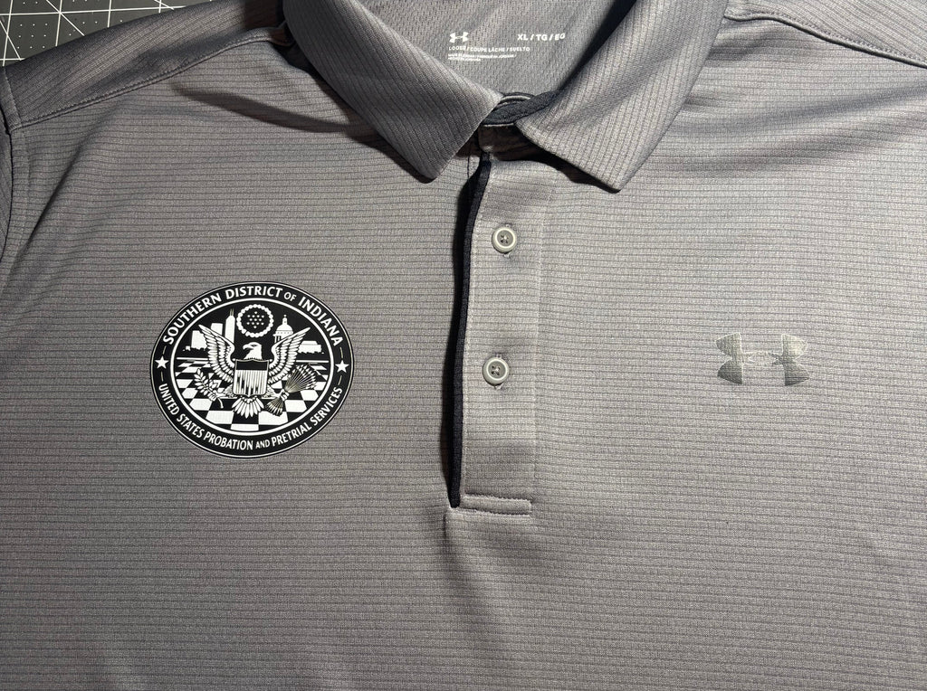 Under Armor polo with embroidered seal
